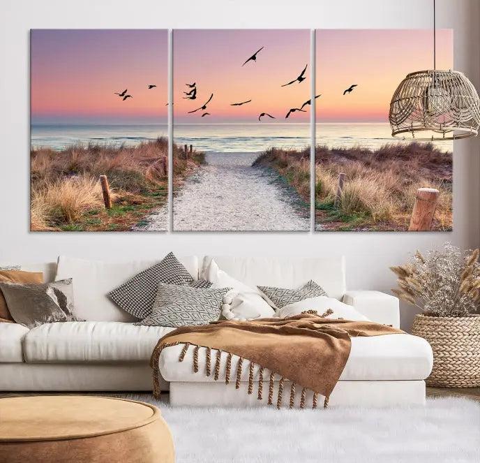 The wall art, titled "Sunset and Ocean Wall Art Canvas Print," is a museum-quality piece depicting a beach path at sunset with birds in flight.