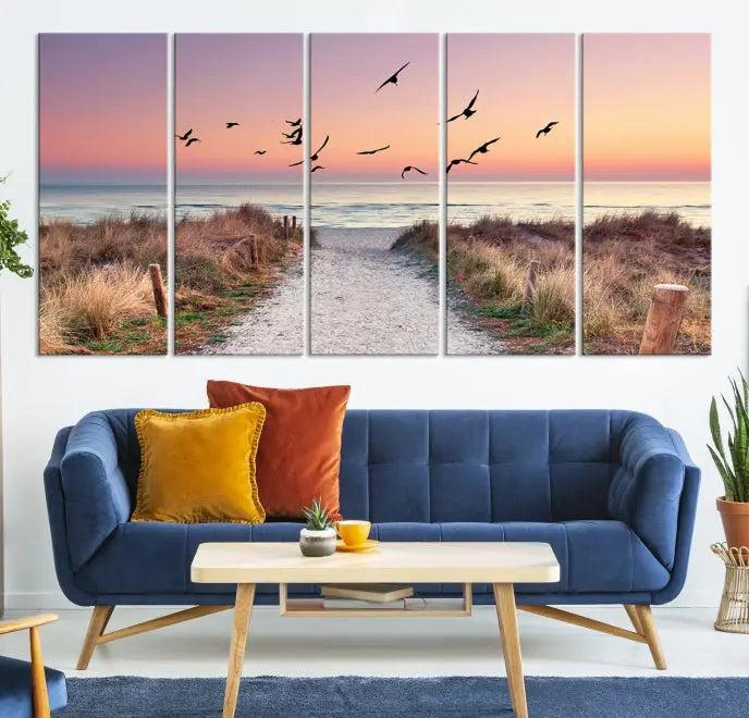 The wall art, titled "Sunset and Ocean Wall Art Canvas Print," is a museum-quality piece depicting a beach path at sunset with birds in flight.