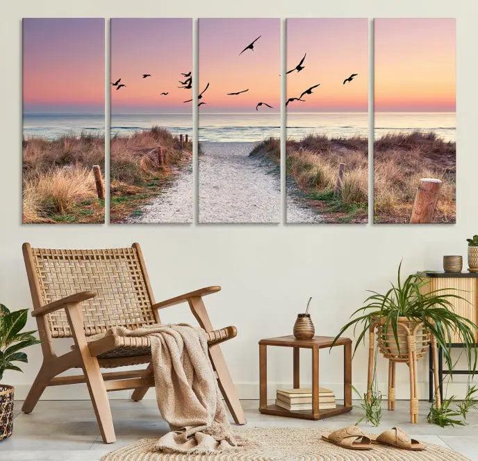 The wall art, titled "Sunset and Ocean Wall Art Canvas Print," is a museum-quality piece depicting a beach path at sunset with birds in flight.