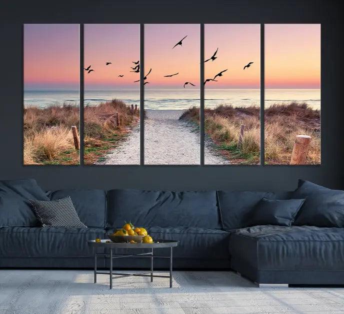 The wall art, titled "Sunset and Ocean Wall Art Canvas Print," is a museum-quality piece depicting a beach path at sunset with birds in flight.