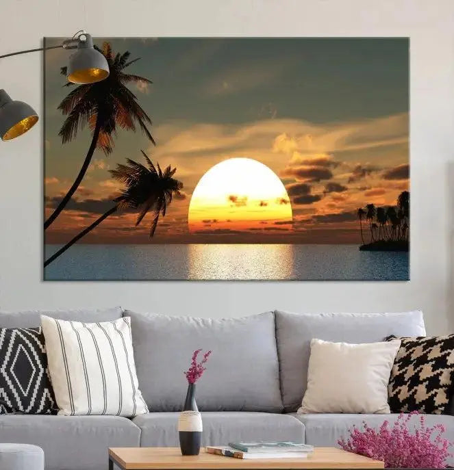 The Sunset and Palms Wall Art Canvas Print features a triptych design showcasing a tropical sunset over the ocean with silhouetted palm trees. These museum-quality canvases, adorned with UV-protective coating to maintain their vibrant appearance, are ready to enhance any room.