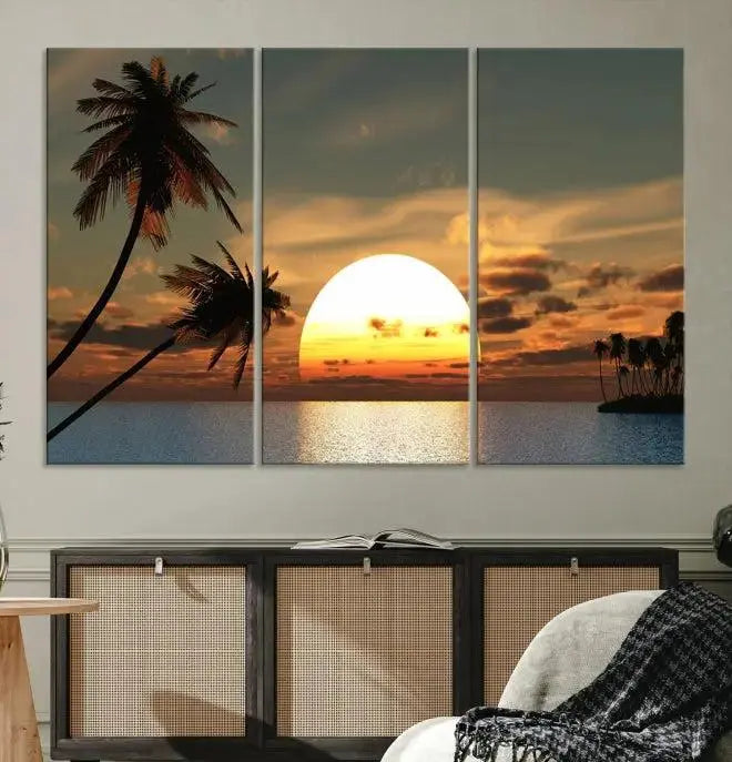 The Sunset and Palms Wall Art Canvas Print features a triptych design showcasing a tropical sunset over the ocean with silhouetted palm trees. These museum-quality canvases, adorned with UV-protective coating to maintain their vibrant appearance, are ready to enhance any room.