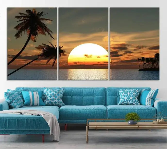 The Sunset and Palms Wall Art Canvas Print features a triptych design showcasing a tropical sunset over the ocean with silhouetted palm trees. These museum-quality canvases, adorned with UV-protective coating to maintain their vibrant appearance, are ready to enhance any room.