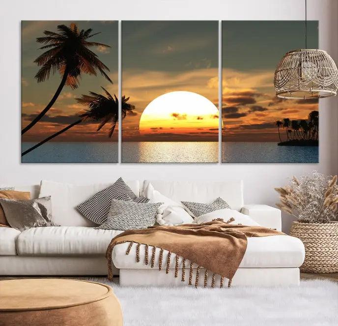 The Sunset and Palms Wall Art Canvas Print features a triptych design showcasing a tropical sunset over the ocean with silhouetted palm trees. These museum-quality canvases, adorned with UV-protective coating to maintain their vibrant appearance, are ready to enhance any room.