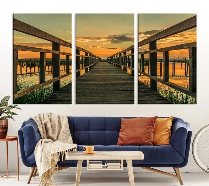 The "Sunset and Wood Bridge" triptych, printed on museum-quality canvases with a UV-protective coating, adorns the wall.