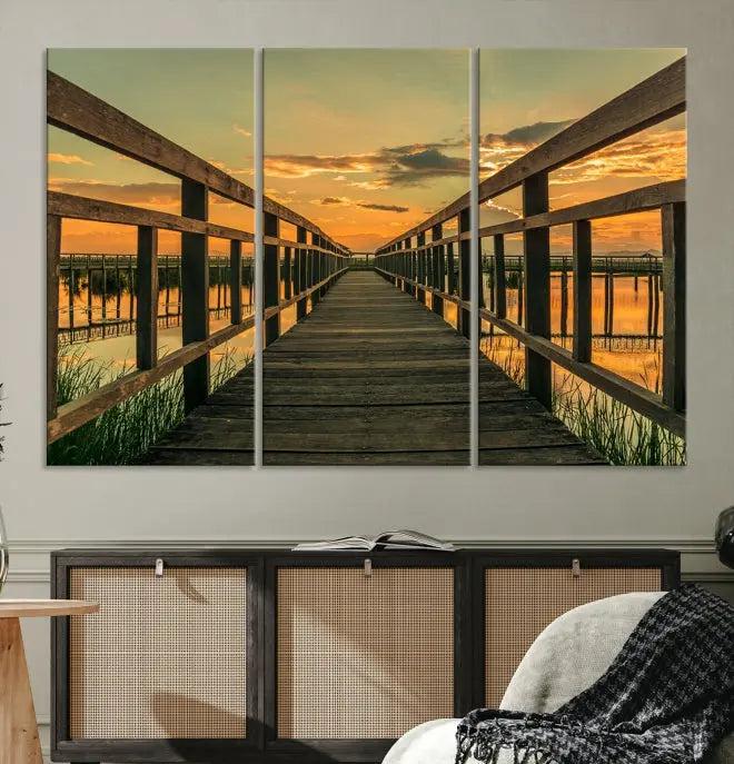 The "Sunset and Wood Bridge" triptych, printed on museum-quality canvases with a UV-protective coating, adorns the wall.