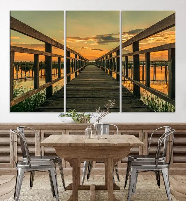 The "Sunset and Wood Bridge" triptych, printed on museum-quality canvases with a UV-protective coating, adorns the wall.