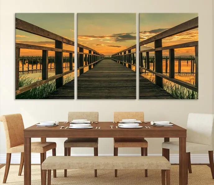 The "Sunset and Wood Bridge" triptych, printed on museum-quality canvases with a UV-protective coating, adorns the wall.