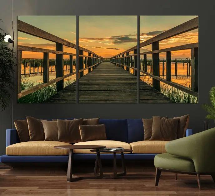 The "Sunset and Wood Bridge" triptych, printed on museum-quality canvases with a UV-protective coating, adorns the wall.