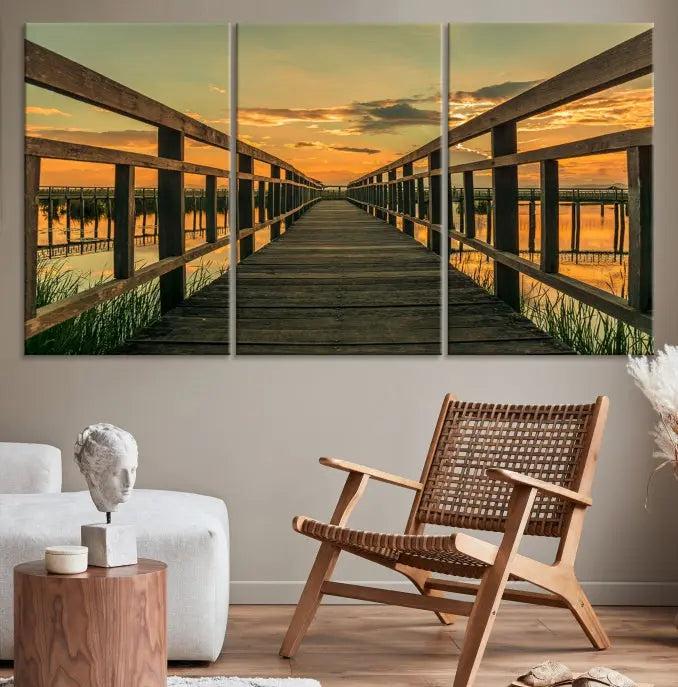 The "Sunset and Wood Bridge" triptych, printed on museum-quality canvases with a UV-protective coating, adorns the wall.