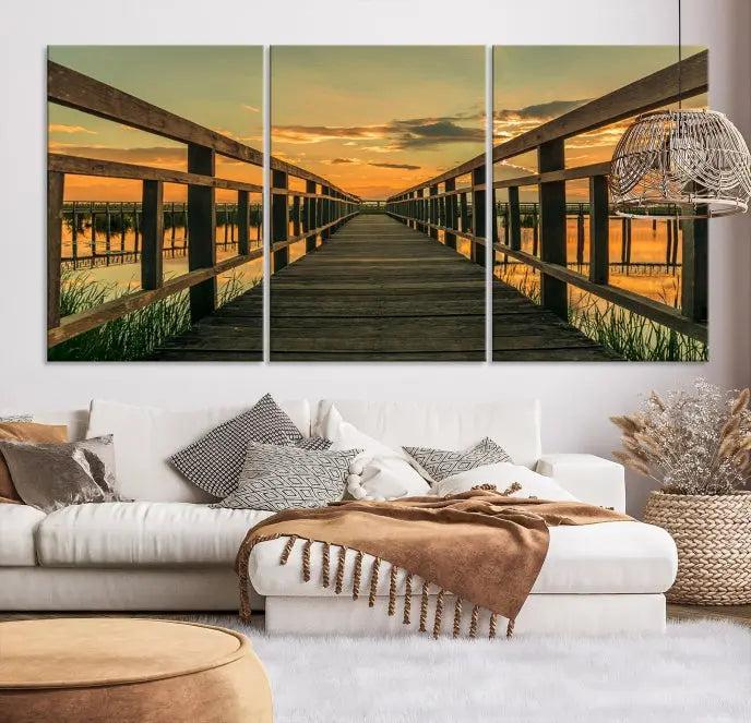 The "Sunset and Wood Bridge" triptych, printed on museum-quality canvases with a UV-protective coating, adorns the wall.