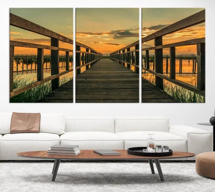 The "Sunset and Wood Bridge" triptych, printed on museum-quality canvases with a UV-protective coating, adorns the wall.