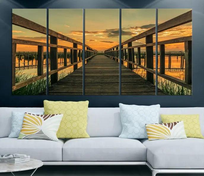 The "Sunset and Wood Bridge" triptych, printed on museum-quality canvases with a UV-protective coating, adorns the wall.