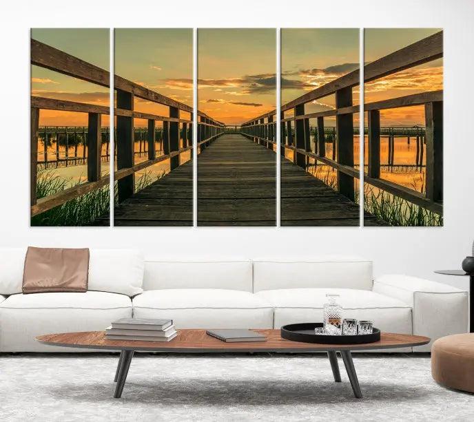 The "Sunset and Wood Bridge" triptych, printed on museum-quality canvases with a UV-protective coating, adorns the wall.