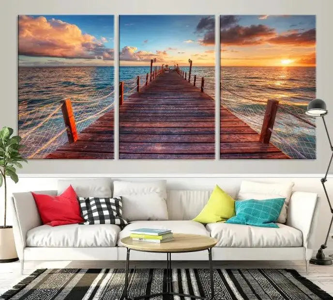 A gallery-wrapped triptych of the "Sunset and Wood Pier Wall Art Canvas Print" is expertly printed on museum-quality canvas with a UV-protective coating.