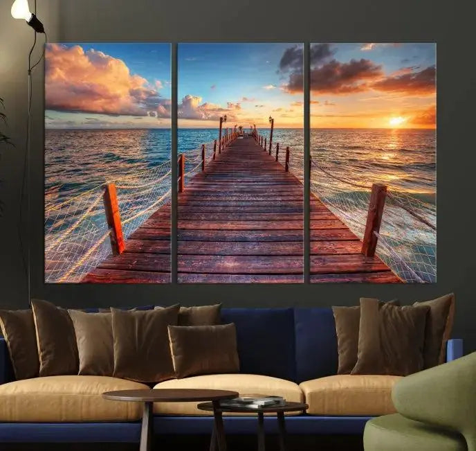 A gallery-wrapped triptych of the "Sunset and Wood Pier Wall Art Canvas Print" is expertly printed on museum-quality canvas with a UV-protective coating.