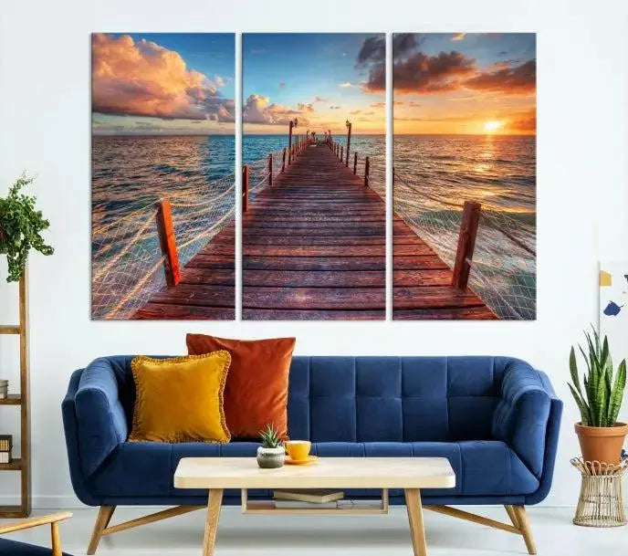 A gallery-wrapped triptych of the "Sunset and Wood Pier Wall Art Canvas Print" is expertly printed on museum-quality canvas with a UV-protective coating.