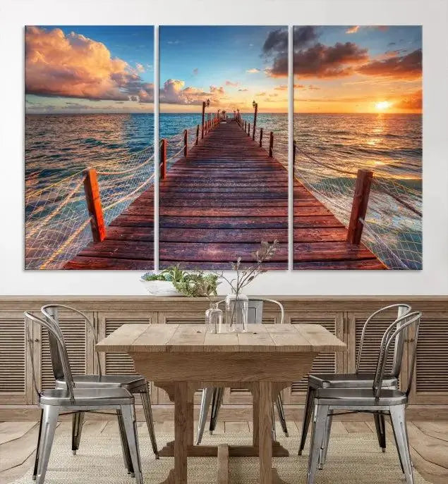 A gallery-wrapped triptych of the "Sunset and Wood Pier Wall Art Canvas Print" is expertly printed on museum-quality canvas with a UV-protective coating.