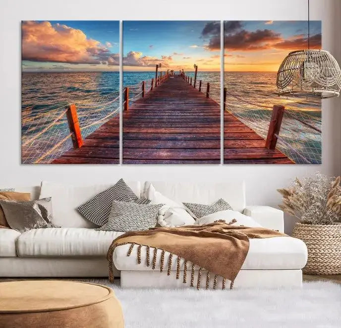 A gallery-wrapped triptych of the "Sunset and Wood Pier Wall Art Canvas Print" is expertly printed on museum-quality canvas with a UV-protective coating.