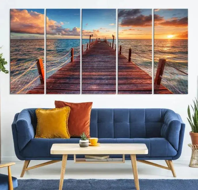 A gallery-wrapped triptych of the "Sunset and Wood Pier Wall Art Canvas Print" is expertly printed on museum-quality canvas with a UV-protective coating.