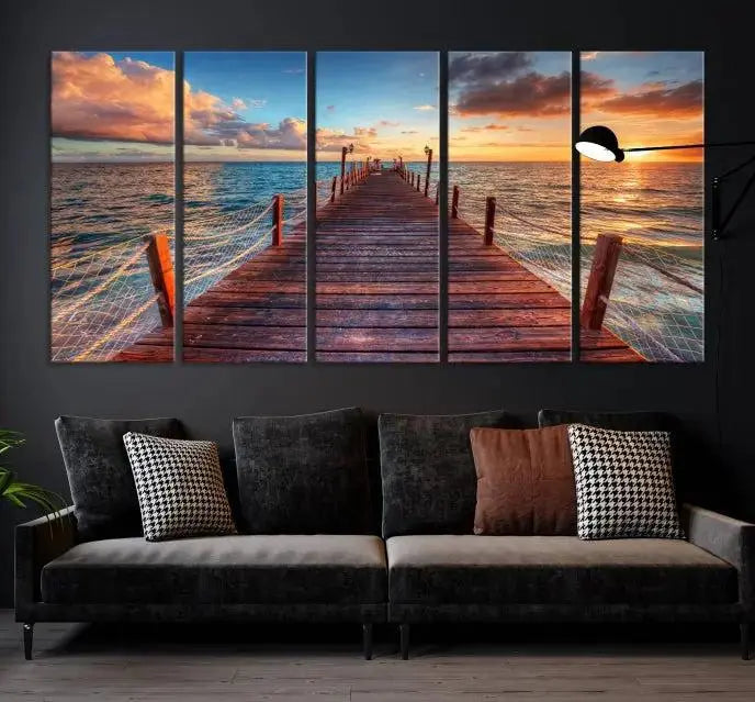 A gallery-wrapped triptych of the "Sunset and Wood Pier Wall Art Canvas Print" is expertly printed on museum-quality canvas with a UV-protective coating.