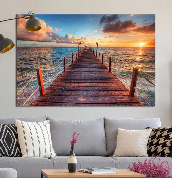 A gallery-wrapped triptych of the "Sunset and Wood Pier Wall Art Canvas Print" is expertly printed on museum-quality canvas with a UV-protective coating.