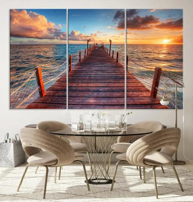 A gallery-wrapped triptych of the "Sunset and Wood Pier Wall Art Canvas Print" is expertly printed on museum-quality canvas with a UV-protective coating.