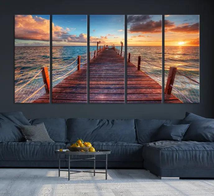 A gallery-wrapped triptych of the "Sunset and Wood Pier Wall Art Canvas Print" is expertly printed on museum-quality canvas with a UV-protective coating.