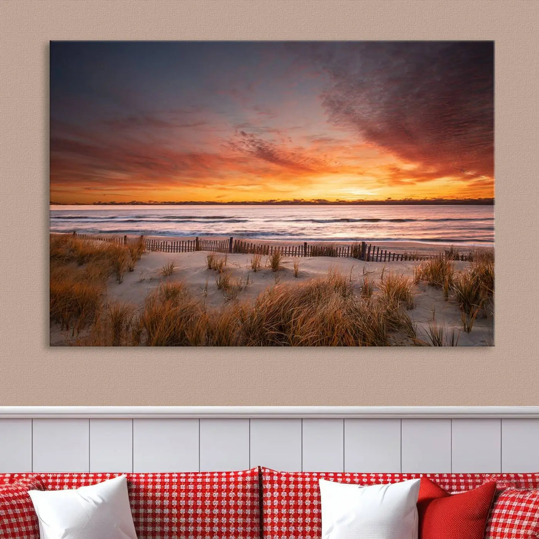 Sunset on The Beach Wall Art Canvas Print features a triptych of a beach at sunset with vivid orange skies, presented on museum-quality canvas. Each section is gallery wrapped, offering lasting beauty with its UV-protective coating.