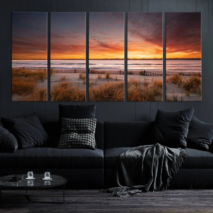 Sunset on The Beach Wall Art Canvas Print features a triptych of a beach at sunset with vivid orange skies, presented on museum-quality canvas. Each section is gallery wrapped, offering lasting beauty with its UV-protective coating.