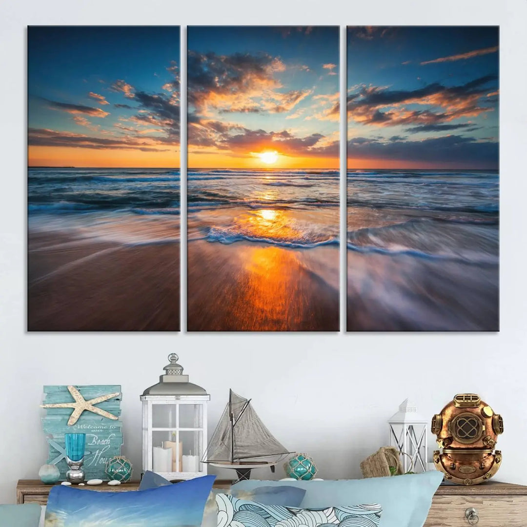 A triptych of "Sunset on the Ocean Beach with Waves," a vibrant coastal wall art print, showcases reflections on the sand during an ocean sunset.