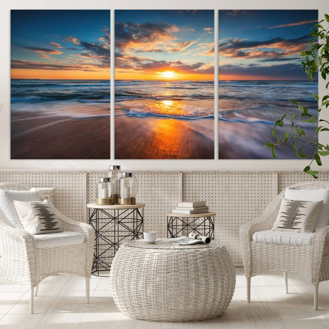 A triptych of "Sunset on the Ocean Beach with Waves," a vibrant coastal wall art print, showcases reflections on the sand during an ocean sunset.