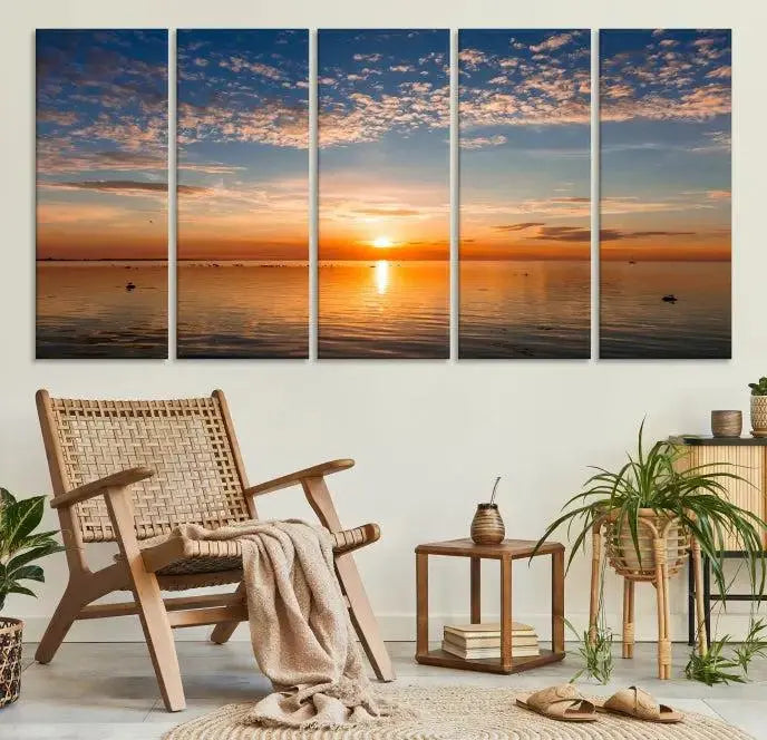 The "Sunset on the Sea Wall Art Canvas Print" graces the space as a stunning triptych, with its museum-quality canvas showcasing a serene sunset over water. The gallery-wrapped edges enhance depth and elegance, creating an ideal centerpiece for any room.