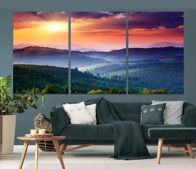 The living room is highlighted by the Sunset over Mountain Forest Canvas Wall Art – Triptych Nature Landscape for Living Room – Ready to Hang.