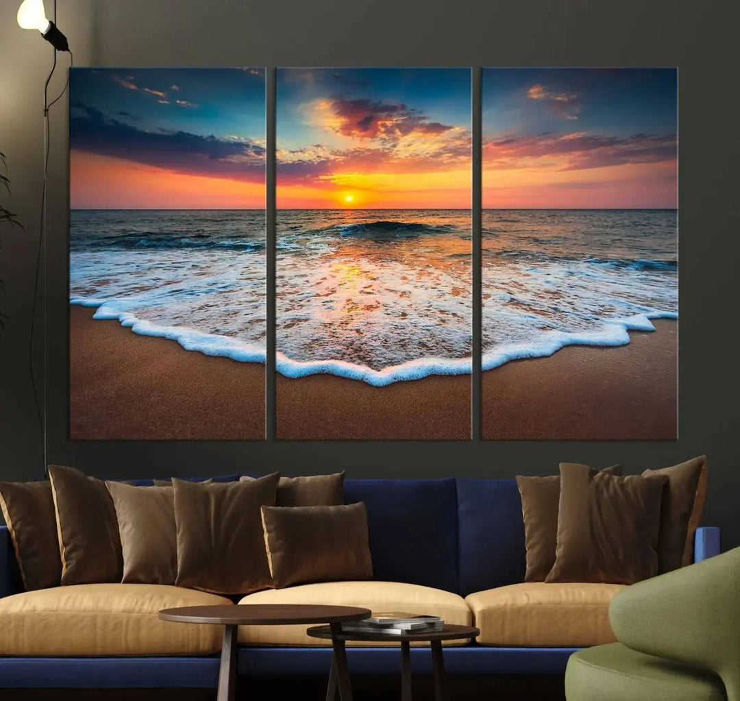 The "Sunset with Calm Waves on the Beach" wall art canvas print, featuring a colorful sunset over the ocean and designed with a UV-protective coating for museum-quality preservation, is prominently displayed.