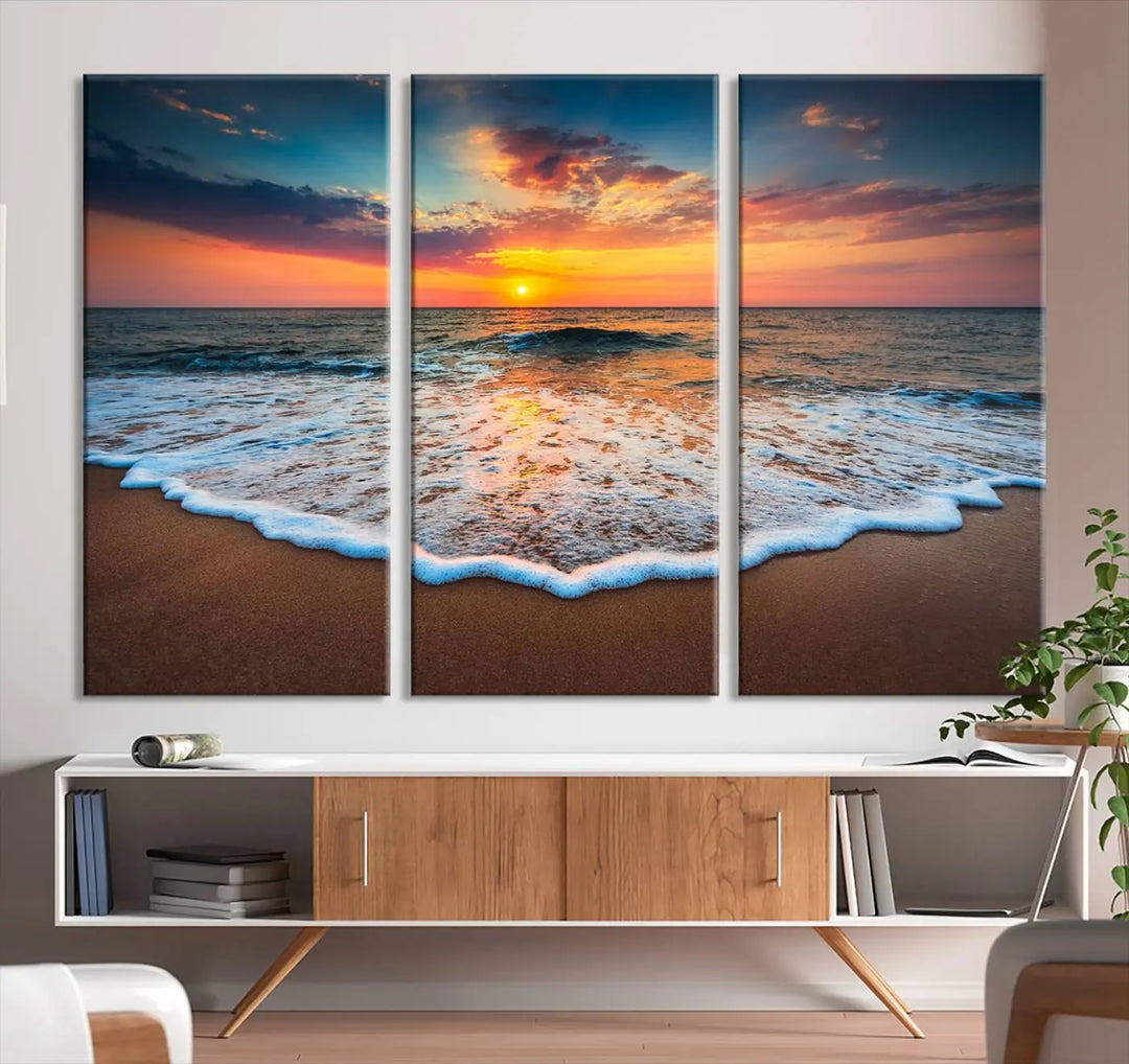 The "Sunset with Calm Waves on the Beach" wall art canvas print, featuring a colorful sunset over the ocean and designed with a UV-protective coating for museum-quality preservation, is prominently displayed.