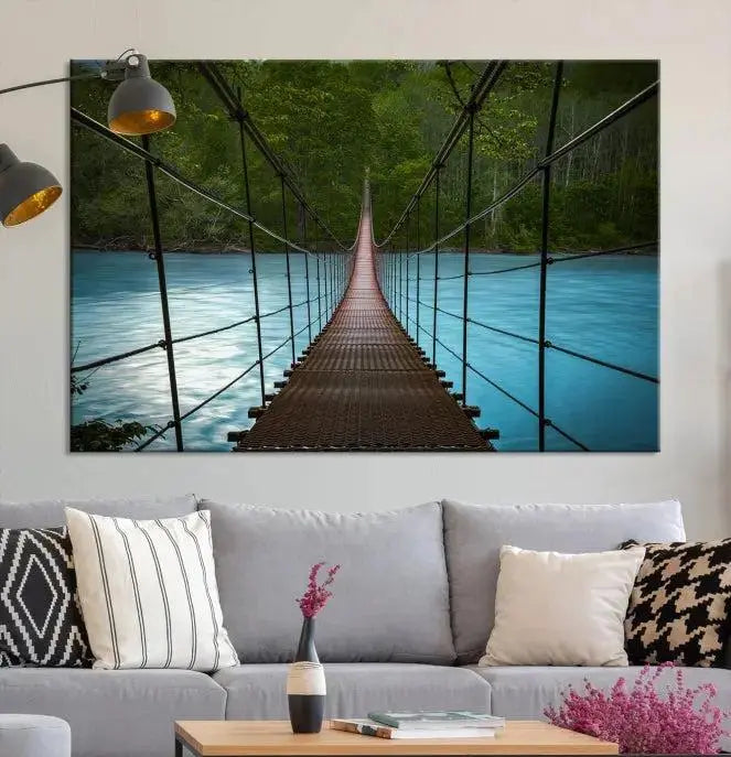 A breathtaking 3-panel nature photography piece titled "Suspension Bridge Over River Canvas Art" beautifully enhances the living room wall, adding an exquisite touch of scenic wall art.