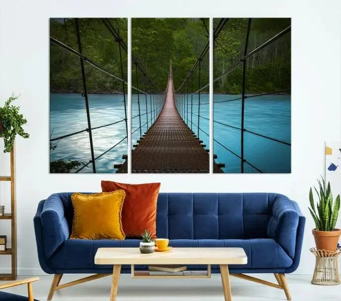 A breathtaking 3-panel nature photography piece titled "Suspension Bridge Over River Canvas Art" beautifully enhances the living room wall, adding an exquisite touch of scenic wall art.