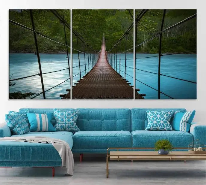 A breathtaking 3-panel nature photography piece titled "Suspension Bridge Over River Canvas Art" beautifully enhances the living room wall, adding an exquisite touch of scenic wall art.