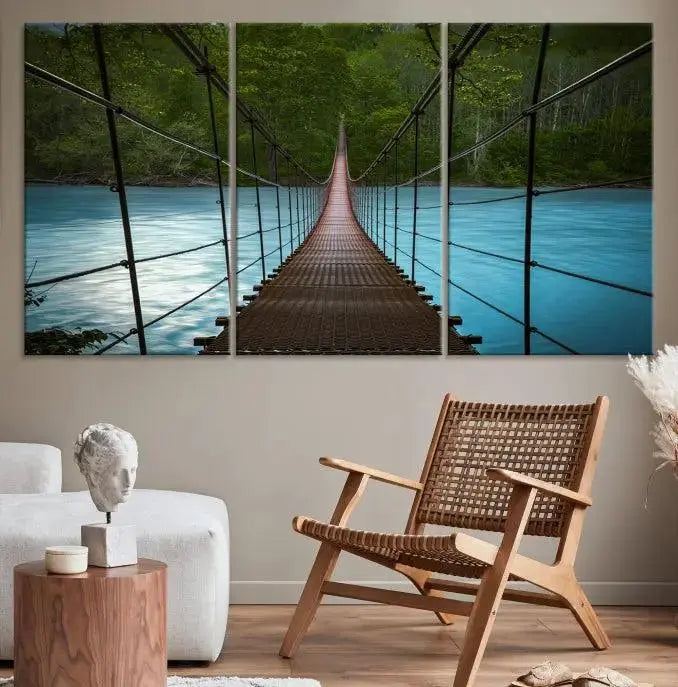 A breathtaking 3-panel nature photography piece titled "Suspension Bridge Over River Canvas Art" beautifully enhances the living room wall, adding an exquisite touch of scenic wall art.