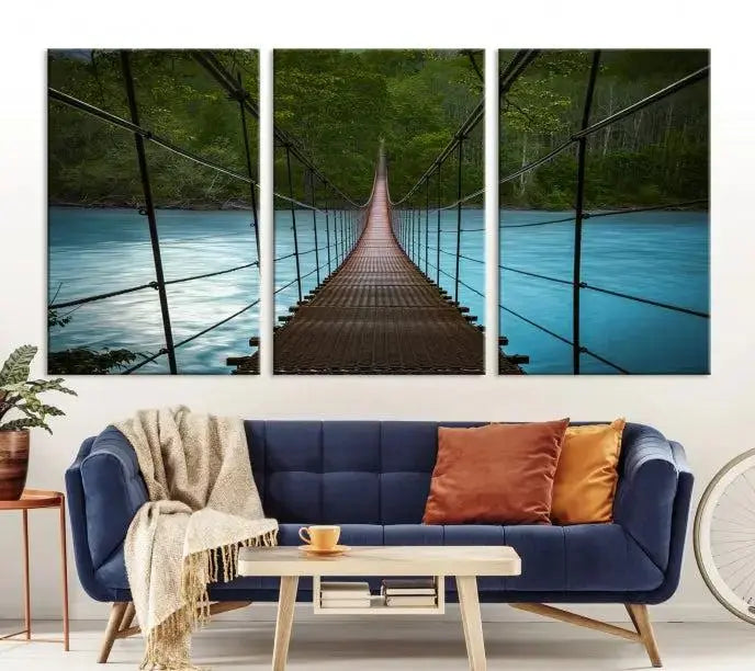 A breathtaking 3-panel nature photography piece titled "Suspension Bridge Over River Canvas Art" beautifully enhances the living room wall, adding an exquisite touch of scenic wall art.