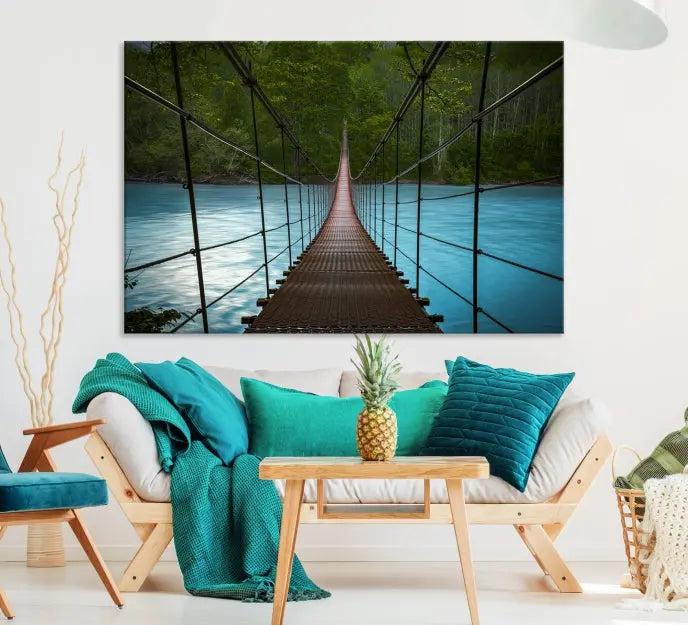 A breathtaking 3-panel nature photography piece titled "Suspension Bridge Over River Canvas Art" beautifully enhances the living room wall, adding an exquisite touch of scenic wall art.