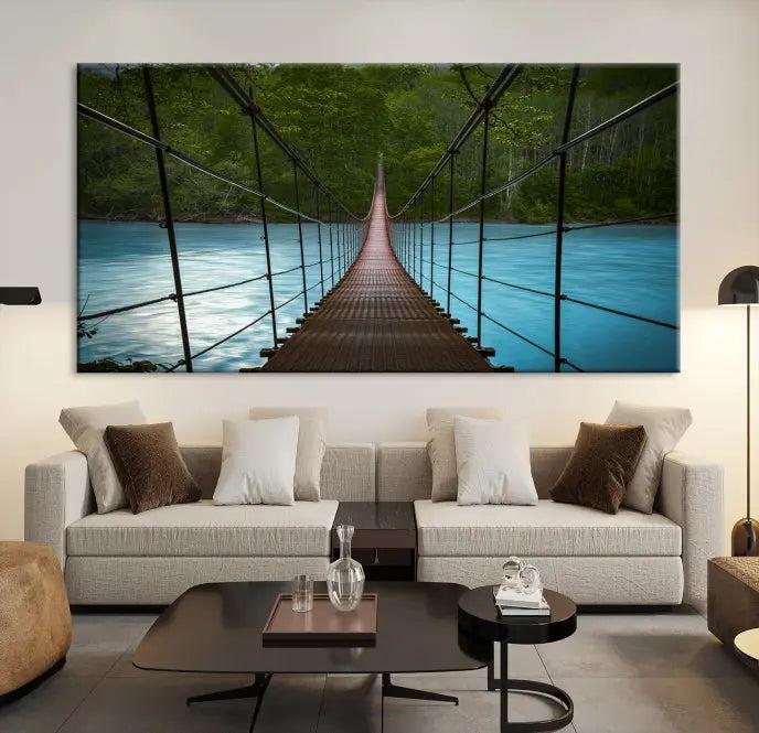 A breathtaking 3-panel nature photography piece titled "Suspension Bridge Over River Canvas Art" beautifully enhances the living room wall, adding an exquisite touch of scenic wall art.