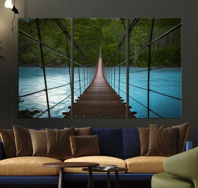 A breathtaking 3-panel nature photography piece titled "Suspension Bridge Over River Canvas Art" beautifully enhances the living room wall, adding an exquisite touch of scenic wall art.