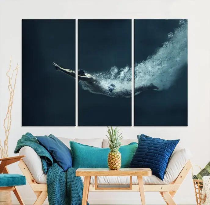 A set of three "Swimmer Wall Art Canvas Print" pieces enhances the wall. These gallery-wrapped artworks are printed on museum-quality canvas and are treated with a UV-protective coating for enduring vibrancy.