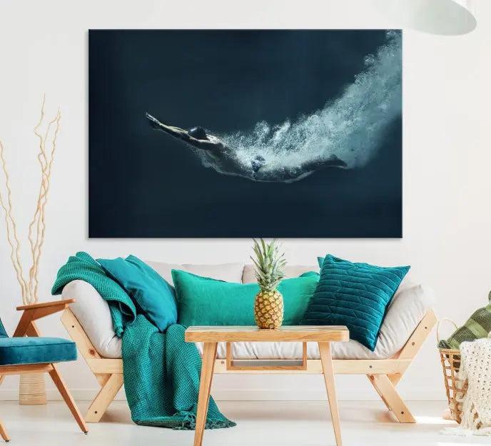 A set of three "Swimmer Wall Art Canvas Print" pieces enhances the wall. These gallery-wrapped artworks are printed on museum-quality canvas and are treated with a UV-protective coating for enduring vibrancy.