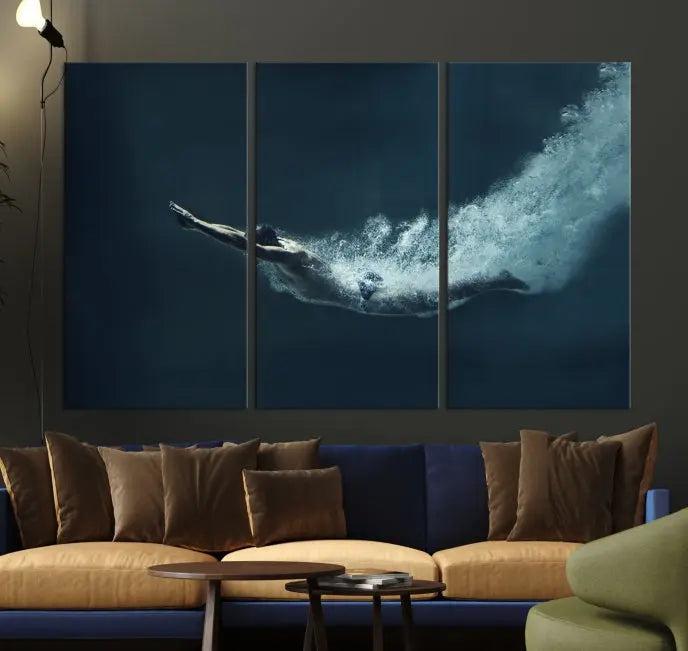 A set of three "Swimmer Wall Art Canvas Print" pieces enhances the wall. These gallery-wrapped artworks are printed on museum-quality canvas and are treated with a UV-protective coating for enduring vibrancy.