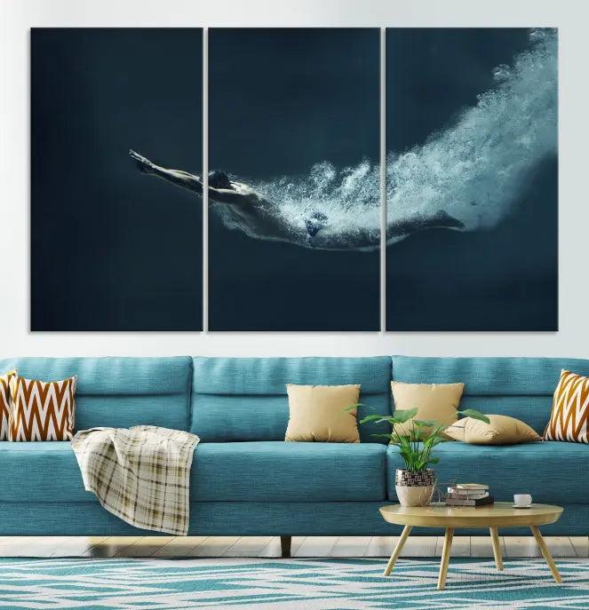 A set of three "Swimmer Wall Art Canvas Print" pieces enhances the wall. These gallery-wrapped artworks are printed on museum-quality canvas and are treated with a UV-protective coating for enduring vibrancy.