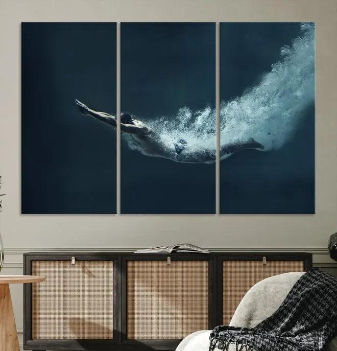 A set of three "Swimmer Wall Art Canvas Print" pieces enhances the wall. These gallery-wrapped artworks are printed on museum-quality canvas and are treated with a UV-protective coating for enduring vibrancy.