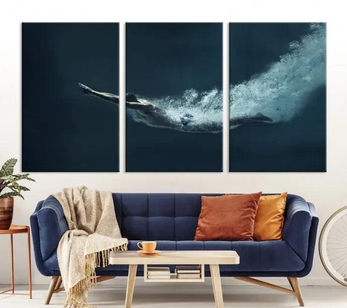 A set of three "Swimmer Wall Art Canvas Print" pieces enhances the wall. These gallery-wrapped artworks are printed on museum-quality canvas and are treated with a UV-protective coating for enduring vibrancy.